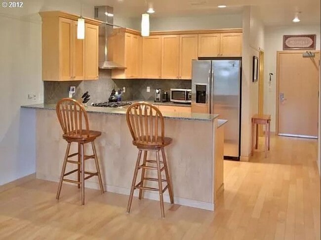 Building Photo - Spacious Beaumont Village Condo with Covered Balcony, W/D, Gas Fireplace