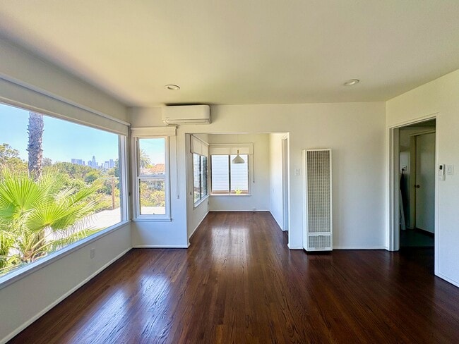 Split-system air conditioning with heating, plus a separate wall heater. - 1672 Rotary Dr