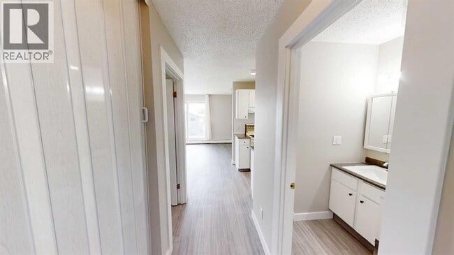 Building Photo - 10028-10105 105 Ave