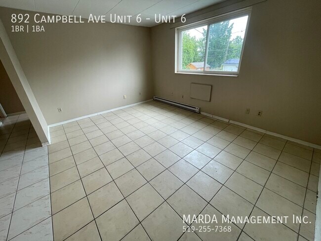 Photo du bâtiment - SPACIOUS 1 BED/1BATH APT - COLLEGE & CAMPBELL + HYDRO! 1/2 MON FREE!!