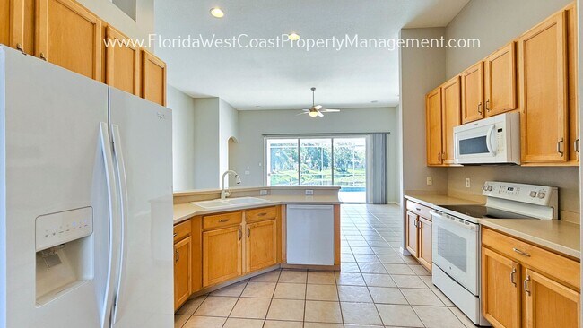 Building Photo - OUTSTANDING LOCATION! LARGE POOL HOME MOVE...