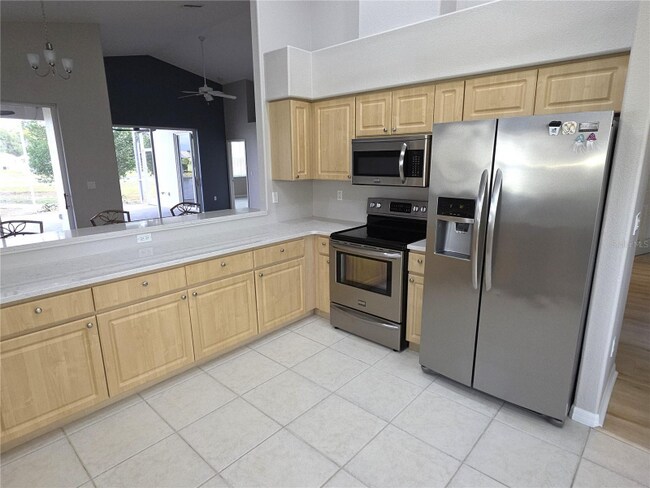 Foto del edificio - 9257 Bonnie Cove Dr