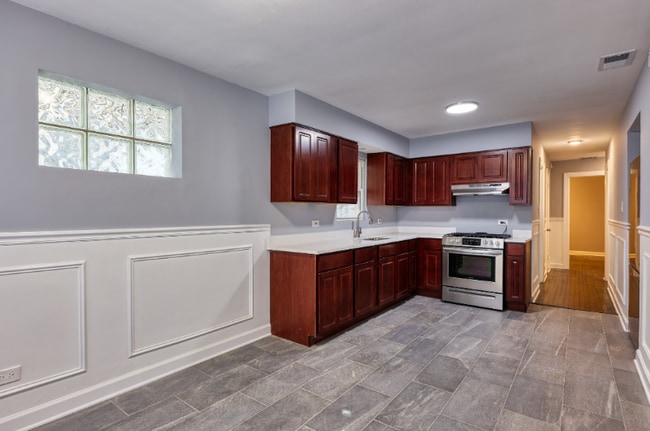 Photo - 7835 S Essex Ave Apartment