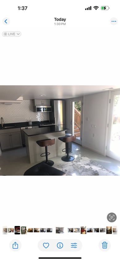 open kitchen/livingroom with sliding glass doors into patio - 524 E 6th Ave