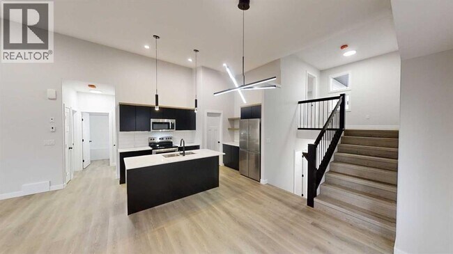 Photo du bâtiment - 10417-10130 130 Ave