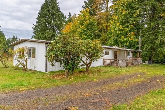 Building Photo - THREE BEDROOM MANUFACTURED HOME WITH SHOP