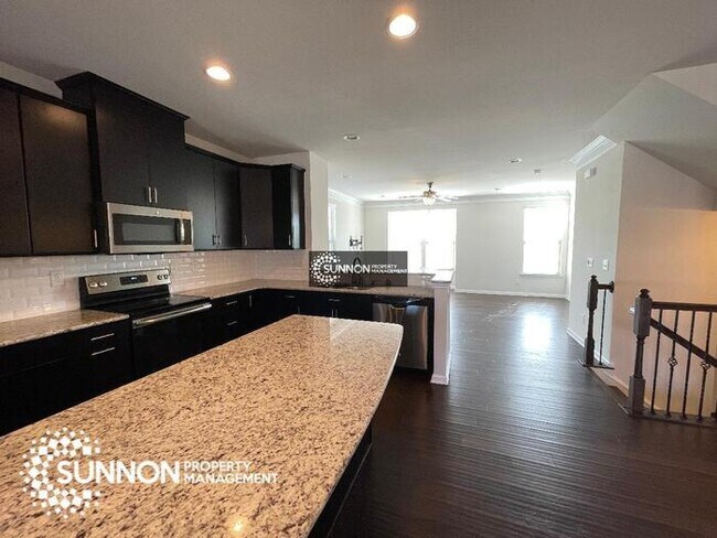 Building Photo - Beautiful 3-story End Unit in City Park!