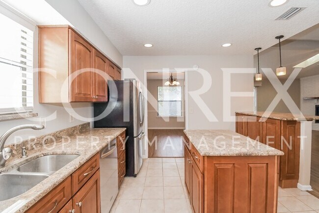 Building Photo - Charming Three Bedroom Now Available