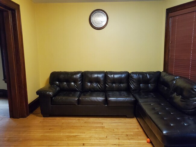 Living room with sectional sofa included - 317 W Doty St