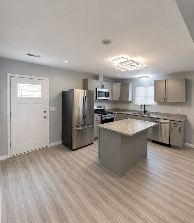 Building Photo - Completely Renovated 3-Bedroom Ranch with Modern Finishes & Spacious Open Kitchen