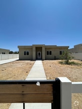 Building Photo - 9232 E Ave T 6