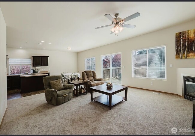 Open floor plan in spacious living room, dining room and kitche - 106 Goldenrod St