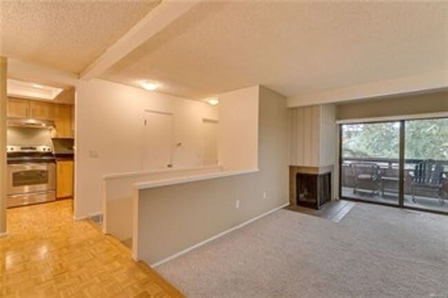 Building Photo - Freshly Updated 3BR Condo w/ Cozy Fireplace, Deck & 2 Parking