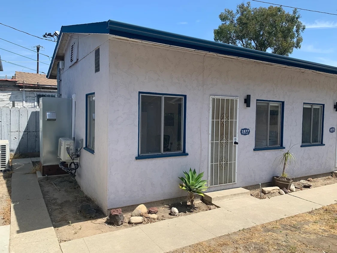 1877 on left side of building - 1877 Gardenia Ave