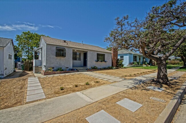Building Photo - BEAUTIFULLY REMODELED, BRIGHT & AIRY LIBER...