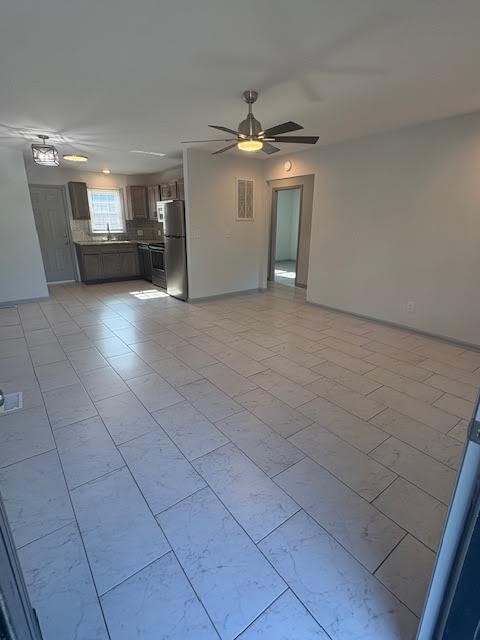 Building Photo - "Cozy 2-Bedroom Retreat with Granite Elega...