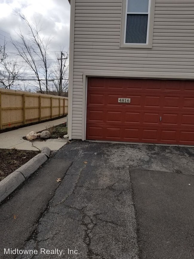 Building Photo - 4816-4816 Woodmark Dr