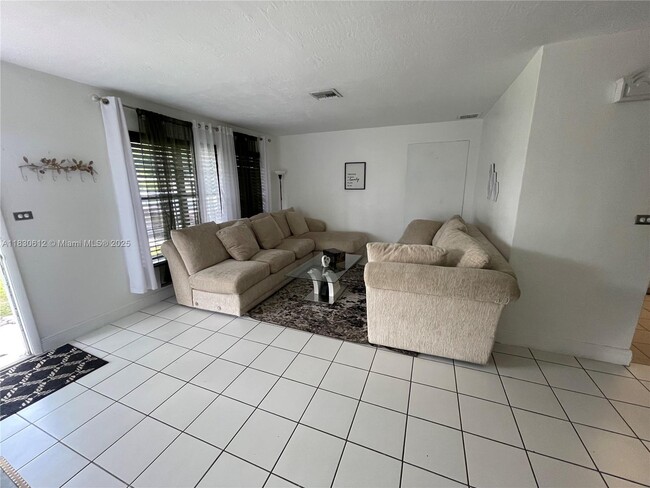 Building Photo - 4641 SW 104th Ct