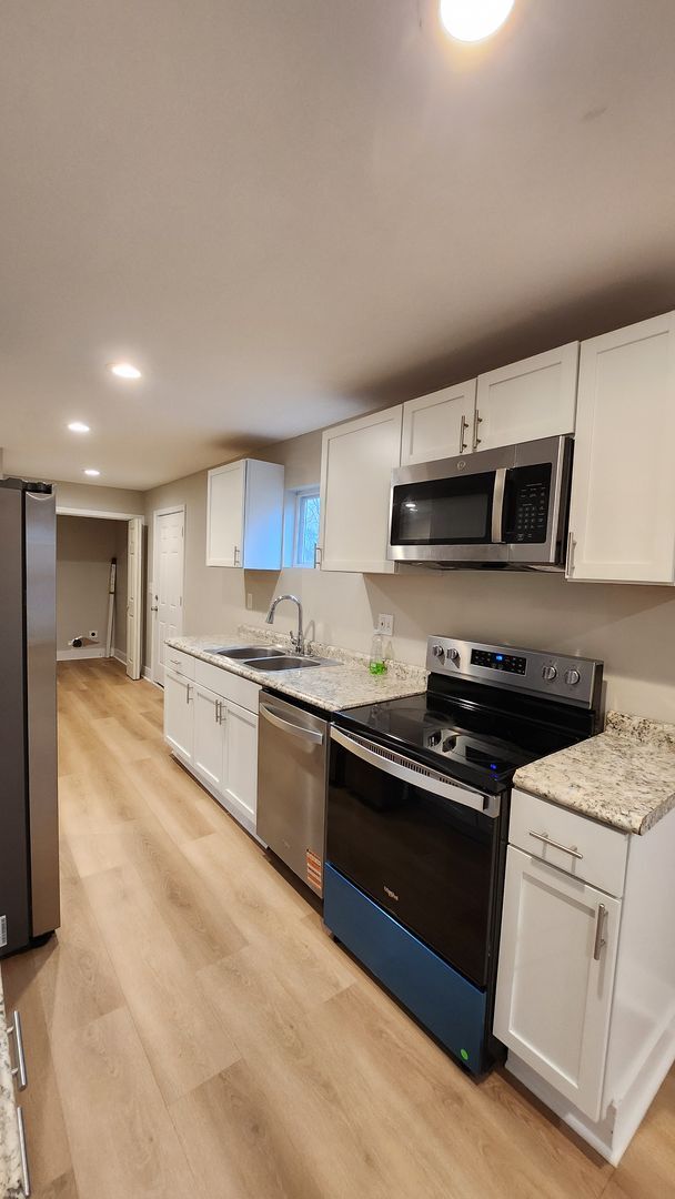 Photo - Renovated 3 bedroom, 2 bath home with a beautiful yard!