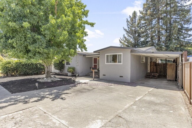 Building Photo - Central Novato Home with Large Yard and A/C!