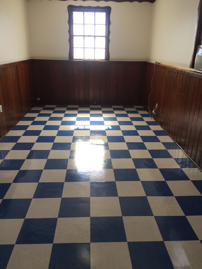 Checkerboard floor is. - 6156 Fair Ave