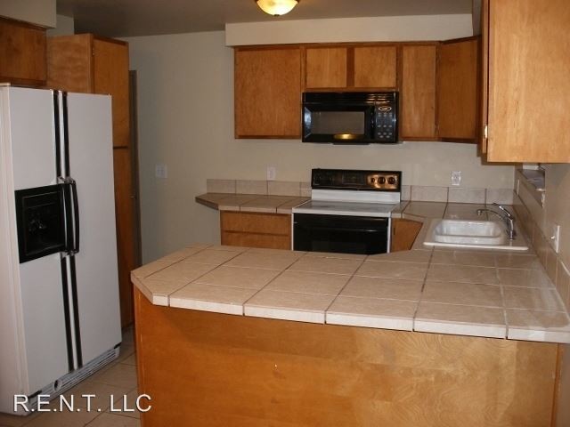 Building Photo - 4 br, 2 bath House - 4939 W. Silvertip Drive