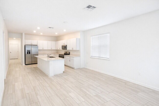 Foto del edificio - "Charming 3-Bed Oasis with Modern Granite Touches in Land O' Lakes!"