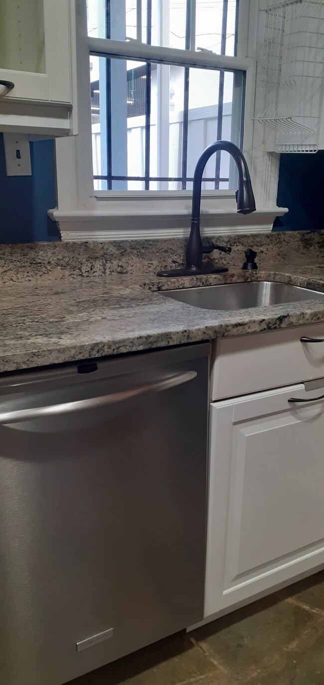 Kitchen w/stainless steel appliances - 730 6th St NE House