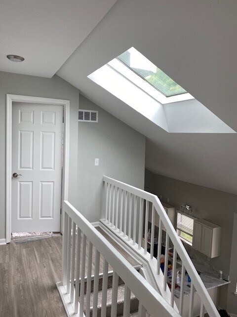 Staircase features large skylight (Northern Exposure) - 6616 Bellows Ct
