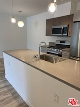 Building Photo - 6640 Woodley Ave