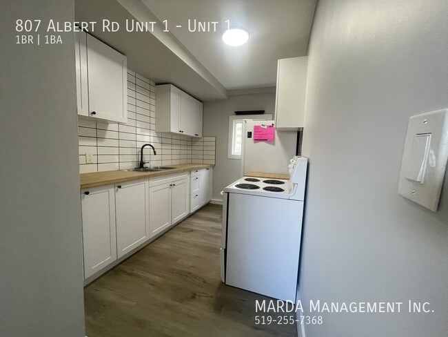 Photo du bâtiment - COZY 1-BEDROOM/1BATH MAIN FLOOR APARTMENT ...