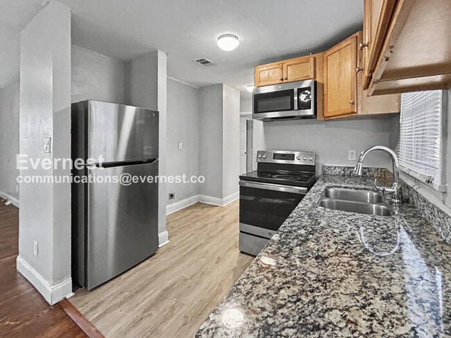 Photo - 3 Bed, 2 Bath Home with Carport / Pet-Friendly /Available Now!