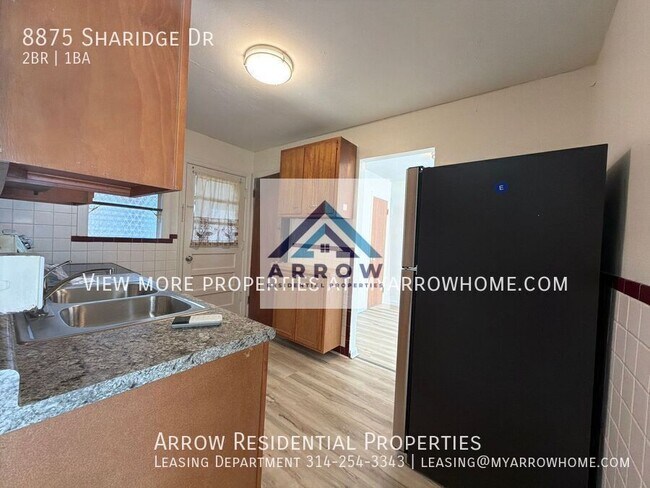 Building Photo - 8875 Sharidge Dr