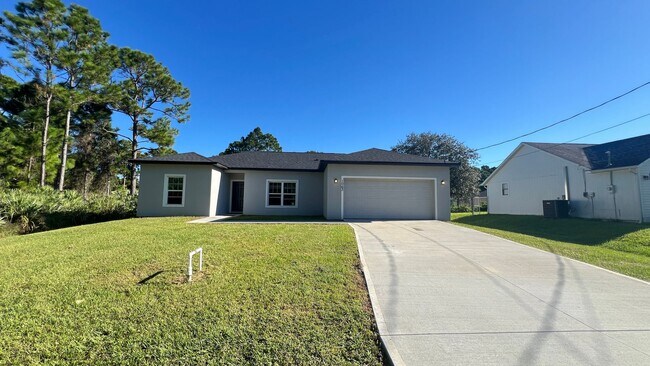 Building Photo - Stylish 3BR/2BA Palm Bay Home – No Water B...