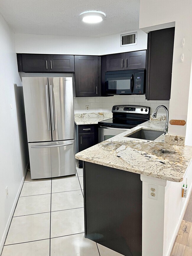 Building Photo - 3717 Atrium Dr