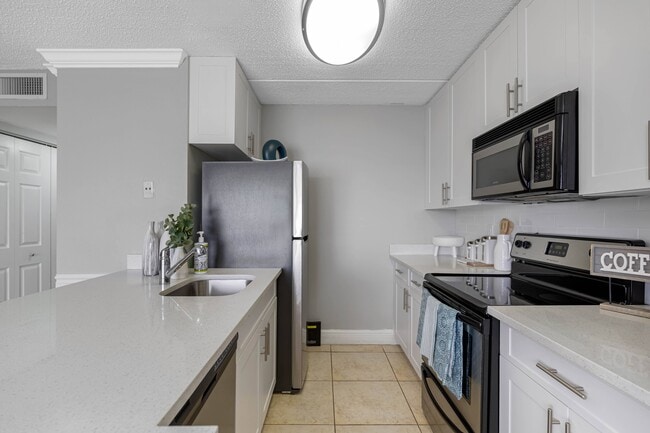 Foto del edificio - Palm Court at Wellington Apartments
