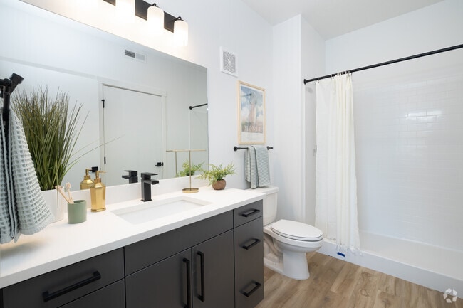 2BD, 2BA - 1100SF - Primary Bathroom - Village Apartments