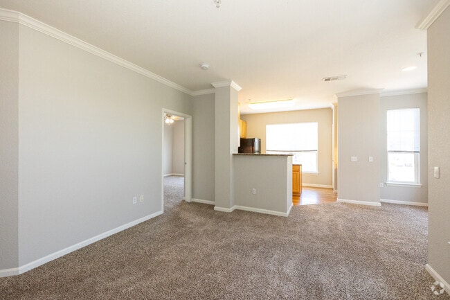 2BR, 2BA - 1138SF - Living Room - Retreat at City Center
