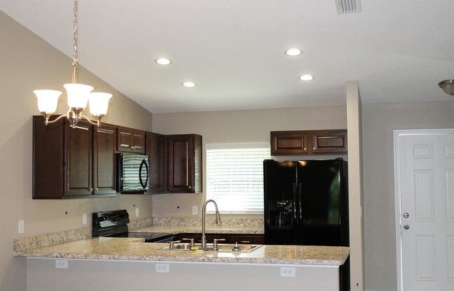 Building Photo - 9210-9210 N Travis Dr