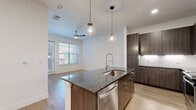 Step into a world of contemporary elegance and effortless living. This stunning 780 sq ft apartment is a testament to modern design, offering a seamless blend of comfort and sophistication. The heart of this home is the open-concept kitchen and living area, where culinary adventures and relaxation seamlessly intertwine. The kitchen is a chef's dream, boasting sleek stainless steel appliances, rich wood cabinetry, and a stylish tile backsplash. Pendant lighting adds a touch of ambiance, perfect for intimate dinners or entertaining friends.

The spacious 160 sq ft bedroom is your personal sanctuary, featuring plush carpeting and ample natural light streaming through large windows. The bathroom is a spa-like retreat, with a modern vanity, expansive mirror, and a luxurious bathtub for ultimate relaxation. Throughout the home, gleaming wood-look flooring and crisp white walls create a bright, airy atmosphere that's both inviting and versatile.

Energy-efficient ceiling fans and recessed lighting add both style and functionality to every room. Two convenient closets provide ample storage space, ensuring a clutter-free living environment. Large windows in the living area and bedroom not only flood the space with natural light but also offer picturesque views of the surrounding area.

This apartment isn't just a place to live; it's a lifestyle upgrade. Whether you're a young professional, a couple starting out, or someone looking to downsize without compromising on quality, this home offers the perfect backdrop for your next chapter. Embrace the art of modern living in this exquisite urban oasis.