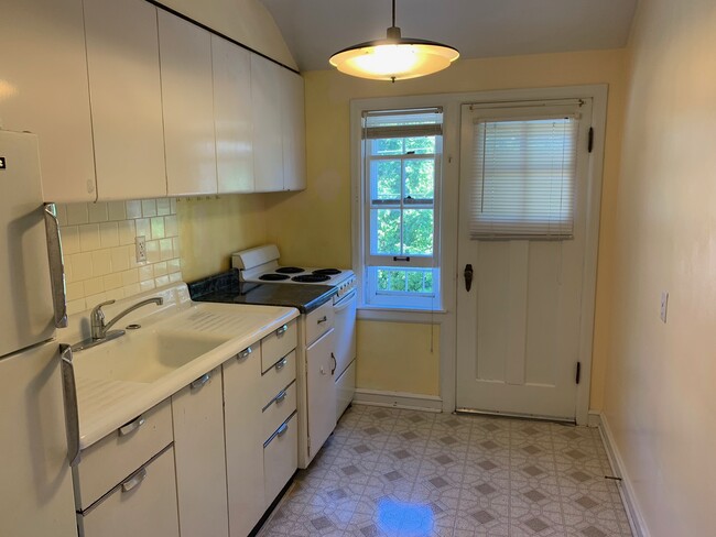 Kitchen space... Stove and Refrigerator included. - 8520 W Watertown Plank Rd