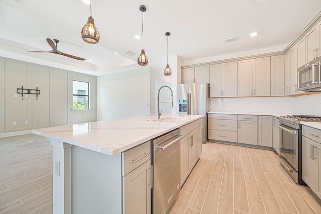 Building Photo - ** Stunning Custom Pool Home ~ Verdana Vil...