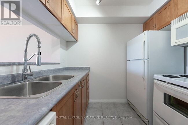 Building Photo - 1733 Queen St E