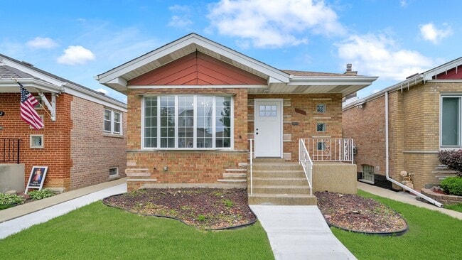 Building Photo - 6408 S Lamon Ave