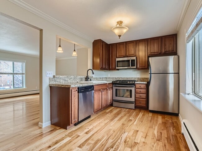 Building Photo - Evolve Real Estate: Welcome to This Charmi...
