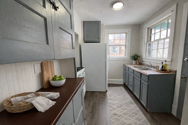 Building Photo - Cozy Akron Home w/ Fireplace Charm, Detached Garage & Back Porch