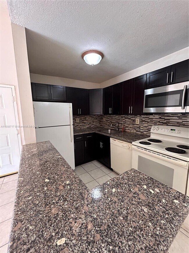 Building Photo - 15630 Southwest 80th Street Apt #I-305, Mi...