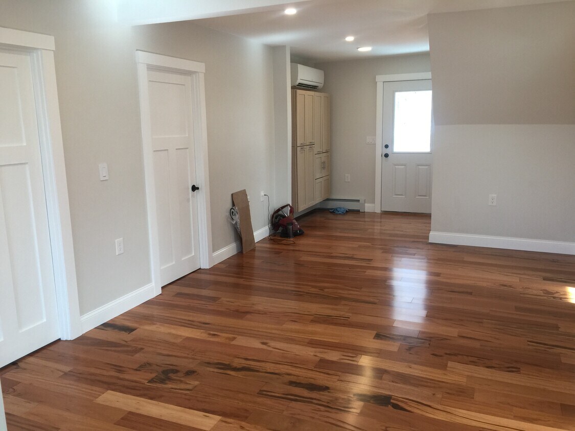 Entry w/ storage cabinets &amp; partial living area - 15 Nashua St