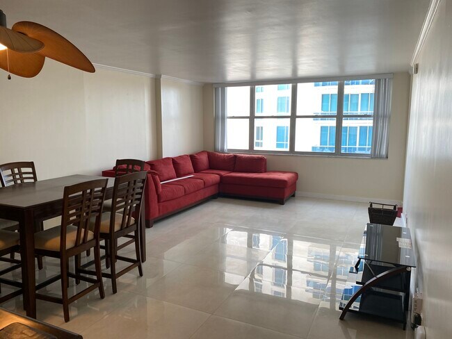 Spacious and luminous living room. - 6039 Collins Ave