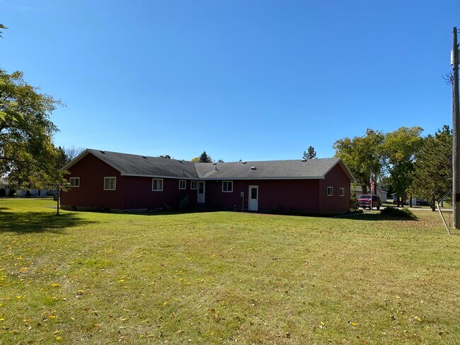 Large open yard for family fun and privacy. - 210 Elm Ave S